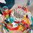 Covor educativ Bright Starts Centru de activitati Baby Einstein Airplaine Jumper
