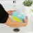 Baveta Skip Hop Bavetica de silicon Fold & Go Skip Hop Zoo Unicorn
