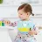 Baveta Skip Hop Bavetica de silicon Fold & Go Skip Hop Zoo Unicorn